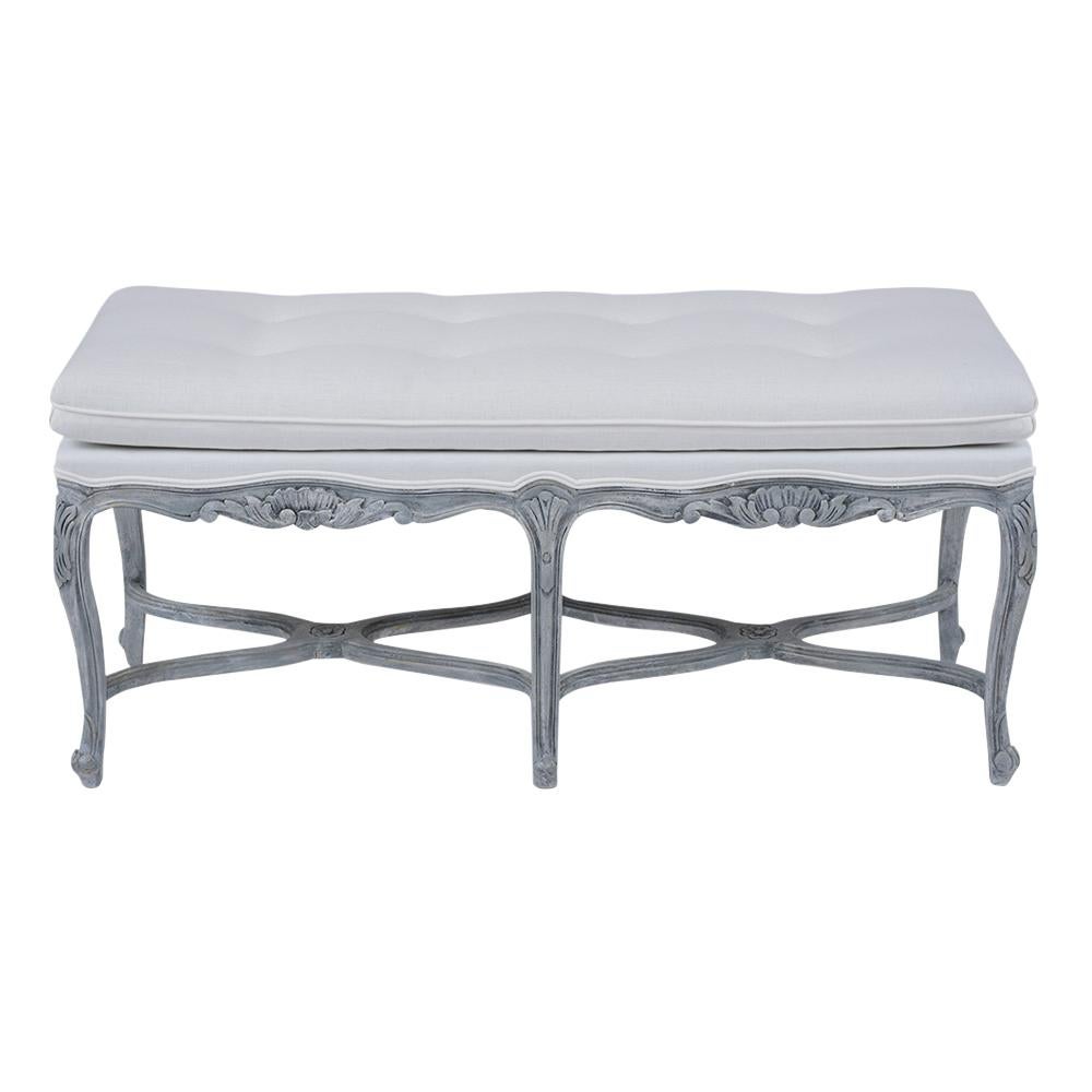 Discover the charm of this vintage 1950s French Louis XV bench, restored to its former glory by our in-house team of expert craftsmen. Crafted from maple wood, this window bench features a timeless design, standing on elegant stretched cabriole