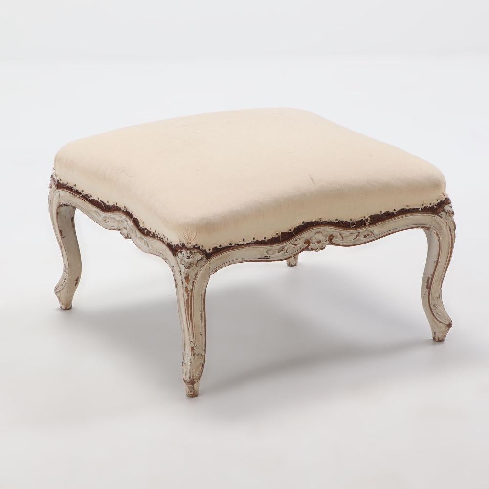 Carved French painted Louis XV style stool having a shaped frame circa 1890. For Sale