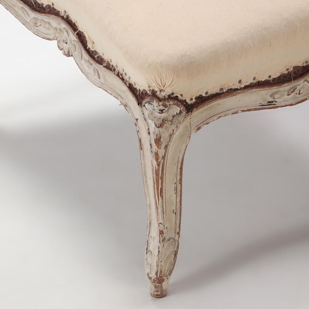 Late 19th Century French painted Louis XV style stool having a shaped frame circa 1890. For Sale