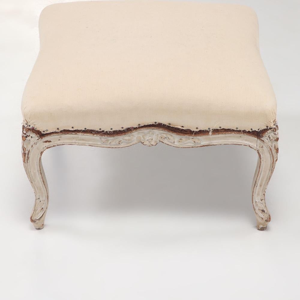 Fabric French painted Louis XV style stool having a shaped frame circa 1890. For Sale