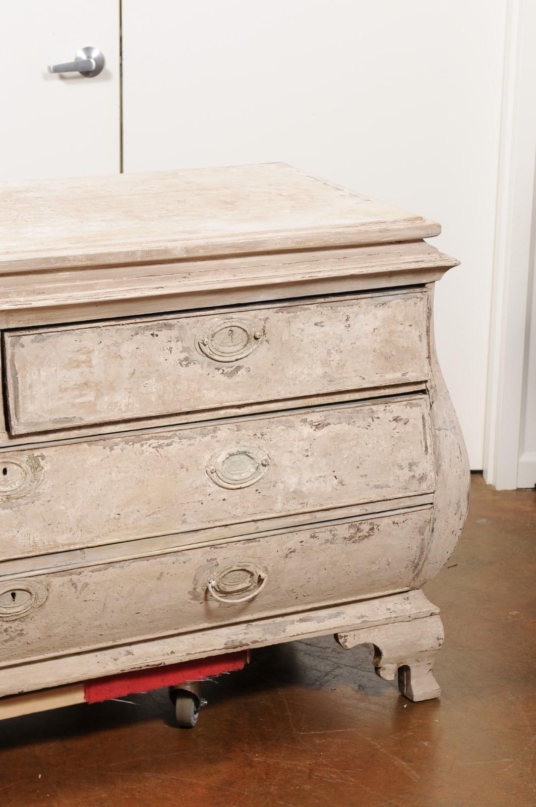 19th Century French Painted Rococo Style Bombé Four-Drawer Chest with Ogee Bracket Feet