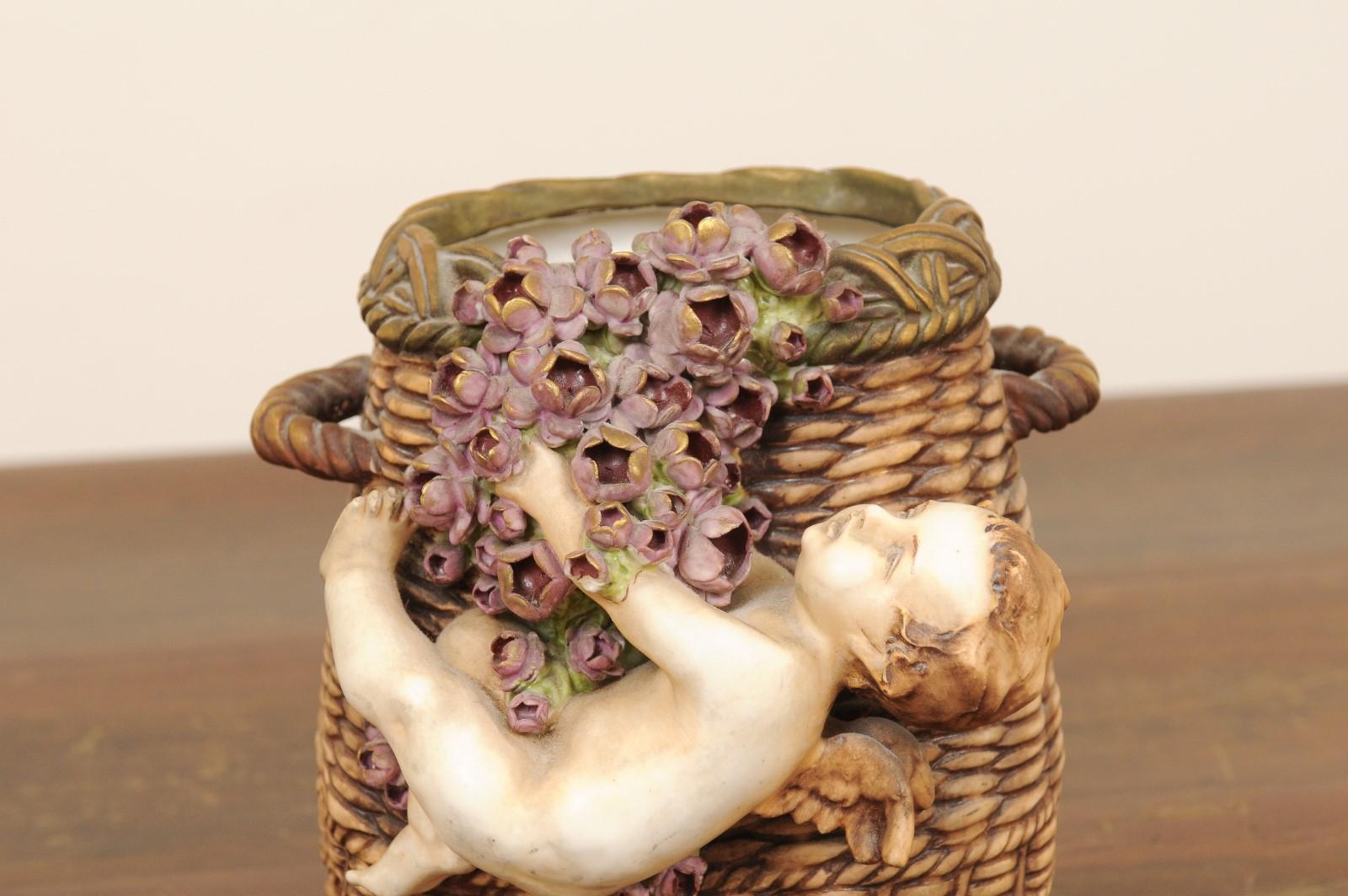 French Painted Terracotta Wicker Basket Vase with Cherub Swinging from Roses In Good Condition For Sale In Atlanta, GA