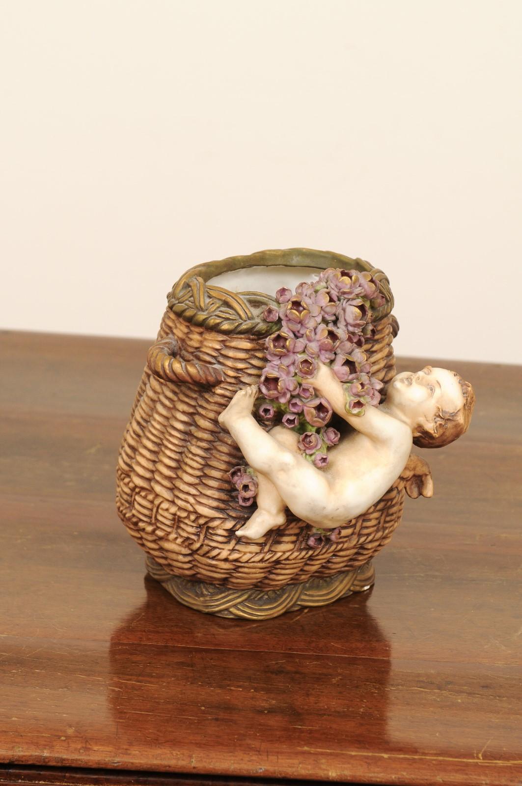 French Painted Terracotta Wicker Basket Vase with Cherub Swinging from Roses For Sale 1