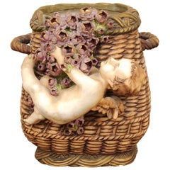 Antique French Painted Terracotta Wicker Basket Vase with Cherub Swinging from Roses