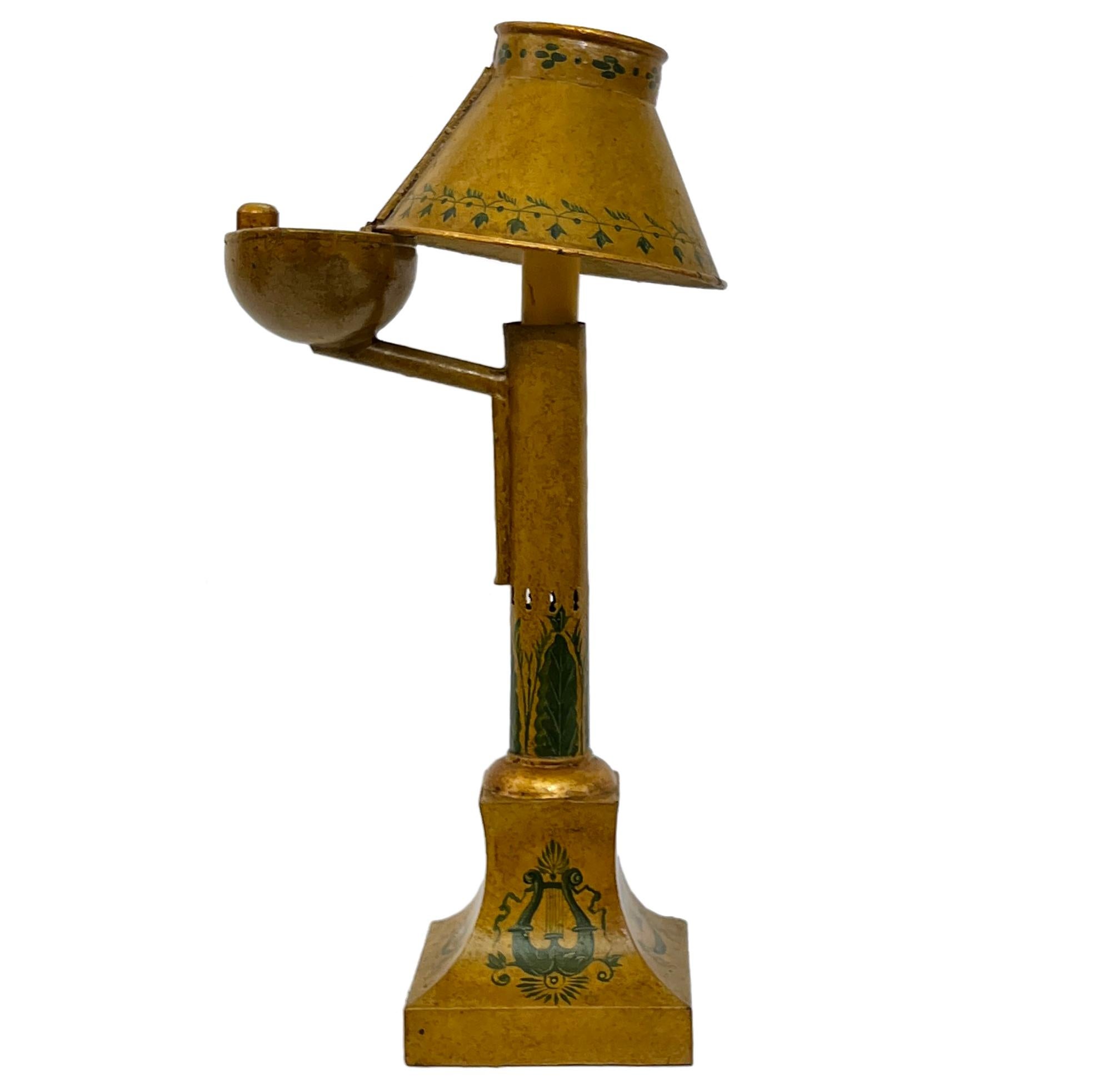 A circa late 19th century French painted tole lamp, wired for electric use.

Measurements:
Height: 14.75
