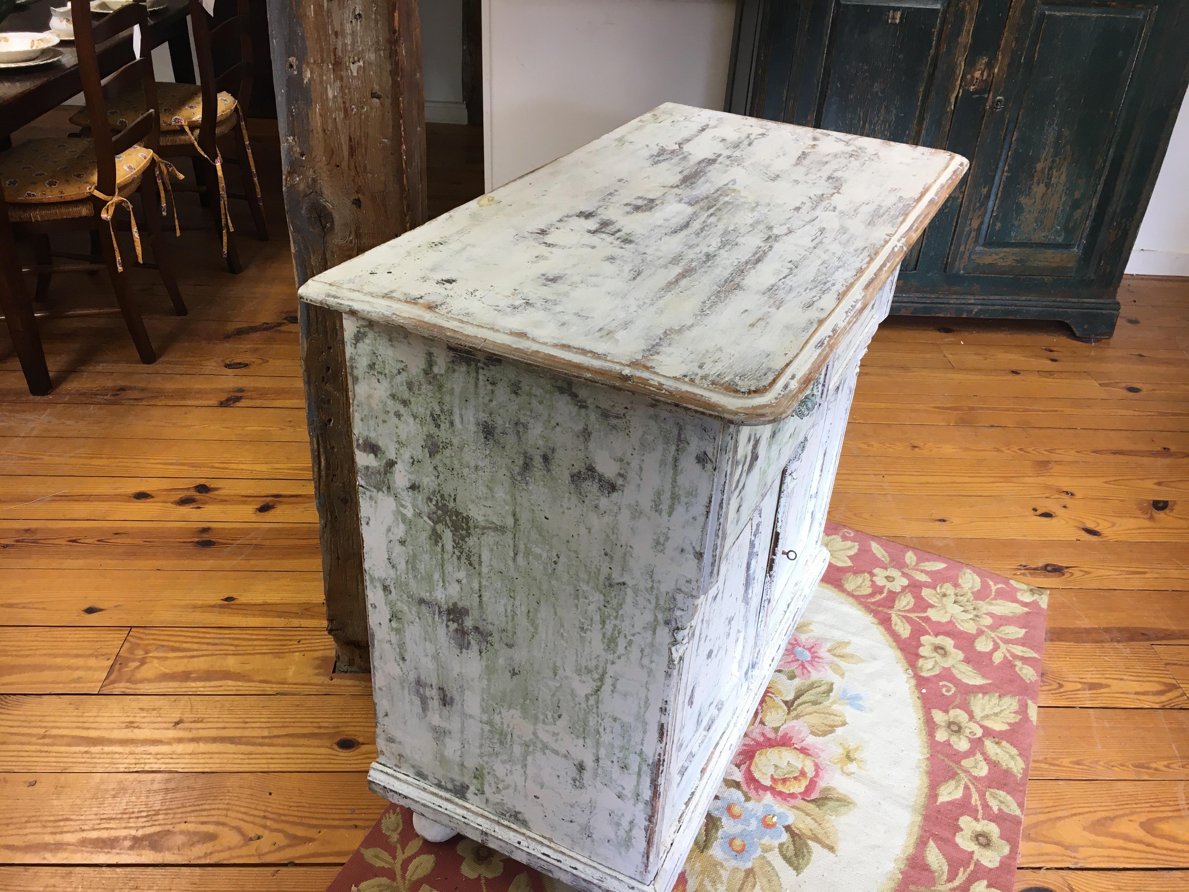 - This is one of the prettiest pieces in our store. The fluting on the sides and middle and beautiful handles for the drawers all make this piece an eye-catching piece of French furniture. The paint is an off-white and the pricing is very fair.