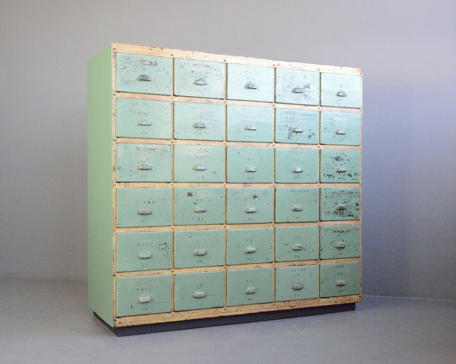 French painted workshop drawers Circa 1930s

- Solid oak drawer fronts
- Solid pine sides and frame
- Original steel cup handles
- 30 large drawers
- Drawers have their original metal rollers
- French ~ 1930s
- 173cm wide x 65cm deep x 166cm