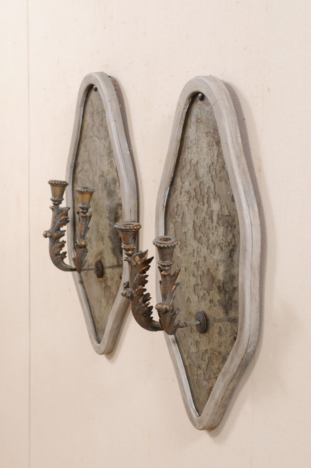 20th Century French Pair of Antiqued Mirrored Wall Plaques with Three-Light Candle Sconces