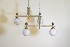 French Pair of Brass Bistro Globe Chandeliers, circa 1910, Now UL Wired