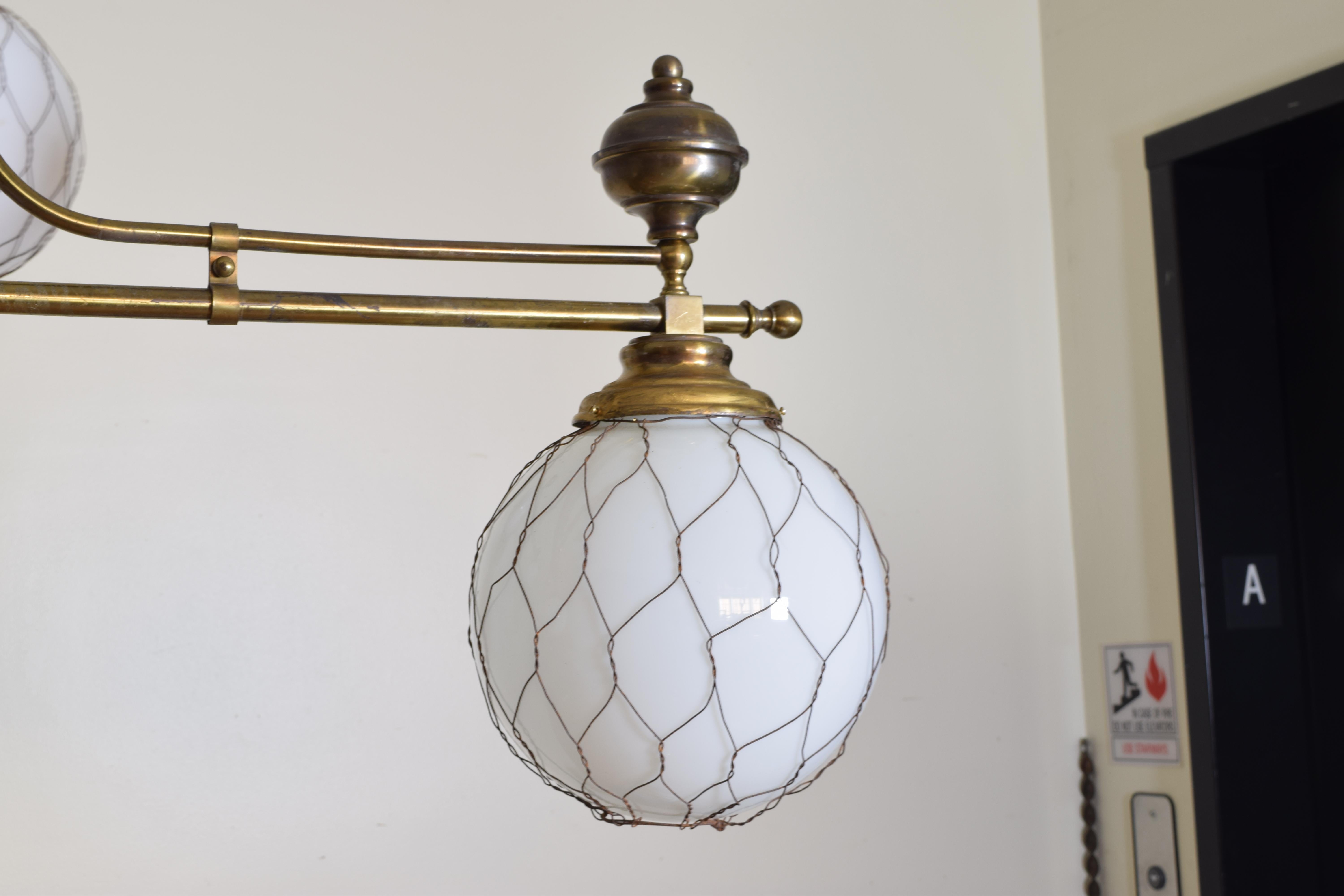 French Pair of Brass Bistro Globe Chandeliers, circa 1910, Now UL Wired 1
