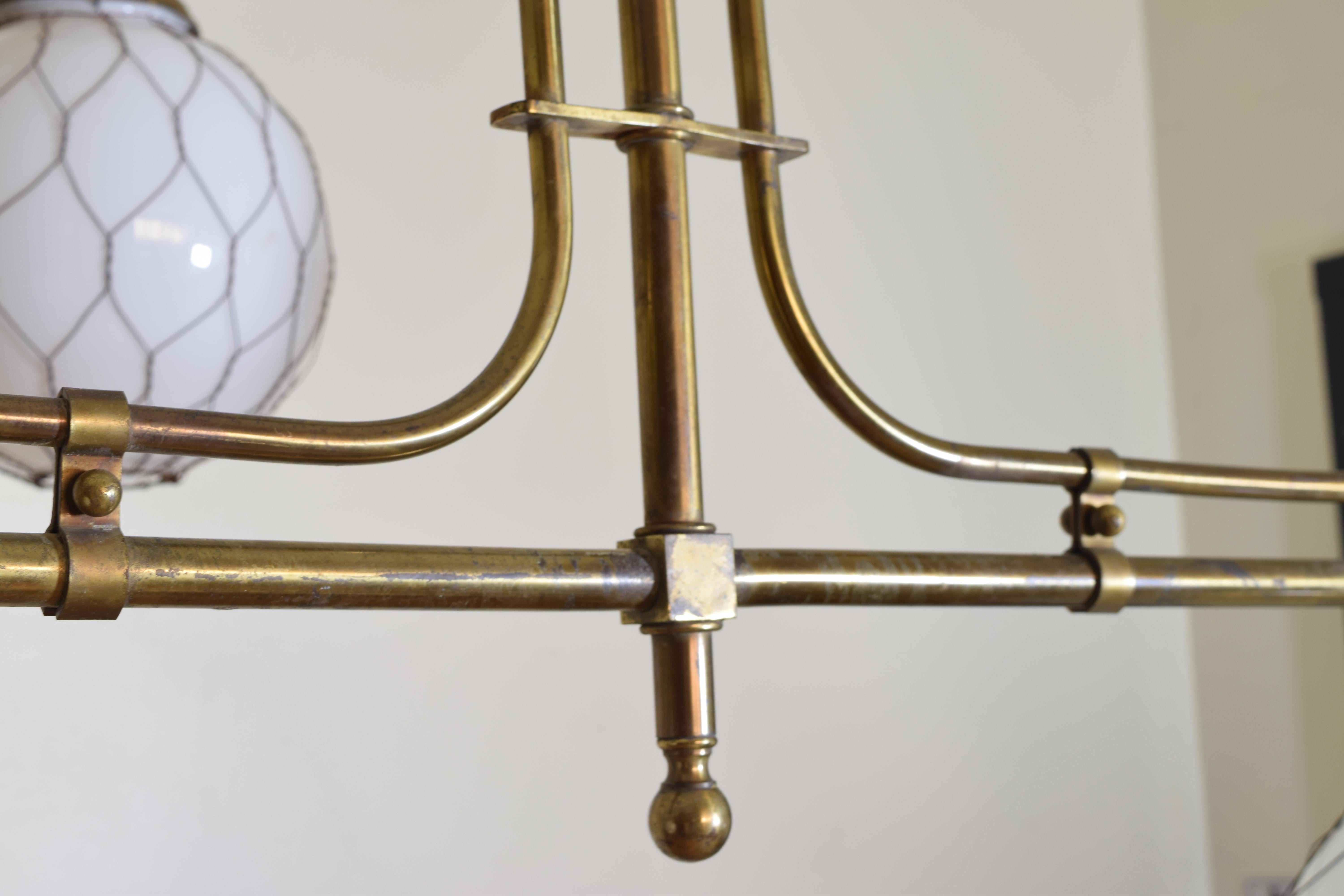 French Pair of Brass Bistro Globe Chandeliers, circa 1910, Now UL Wired 2