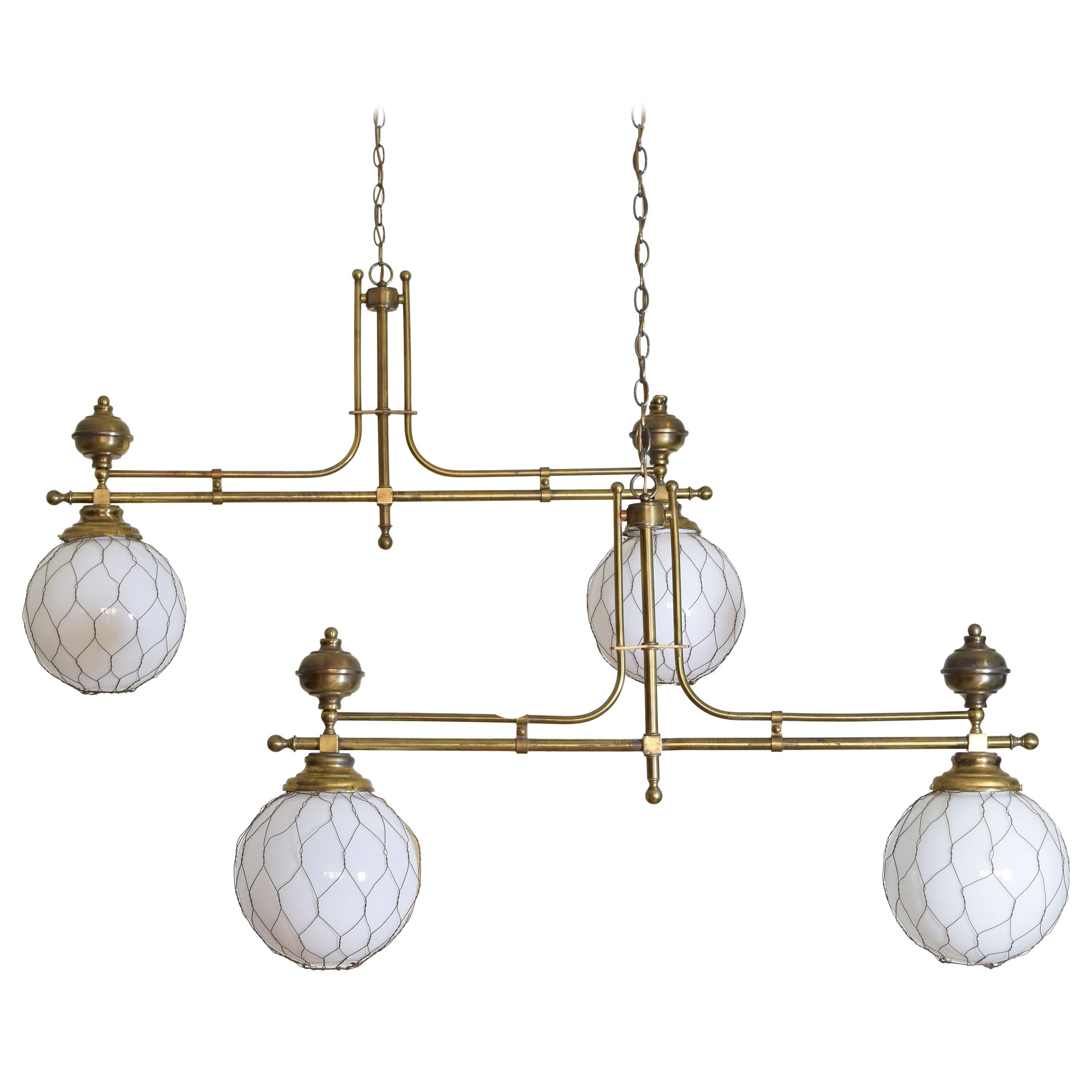 French Pair of Brass Bistro Globe Chandeliers, circa 1910, Now UL Wired