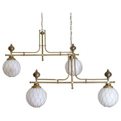 French Pair of Brass Bistro Globe Chandeliers, circa 1910, Now UL Wired