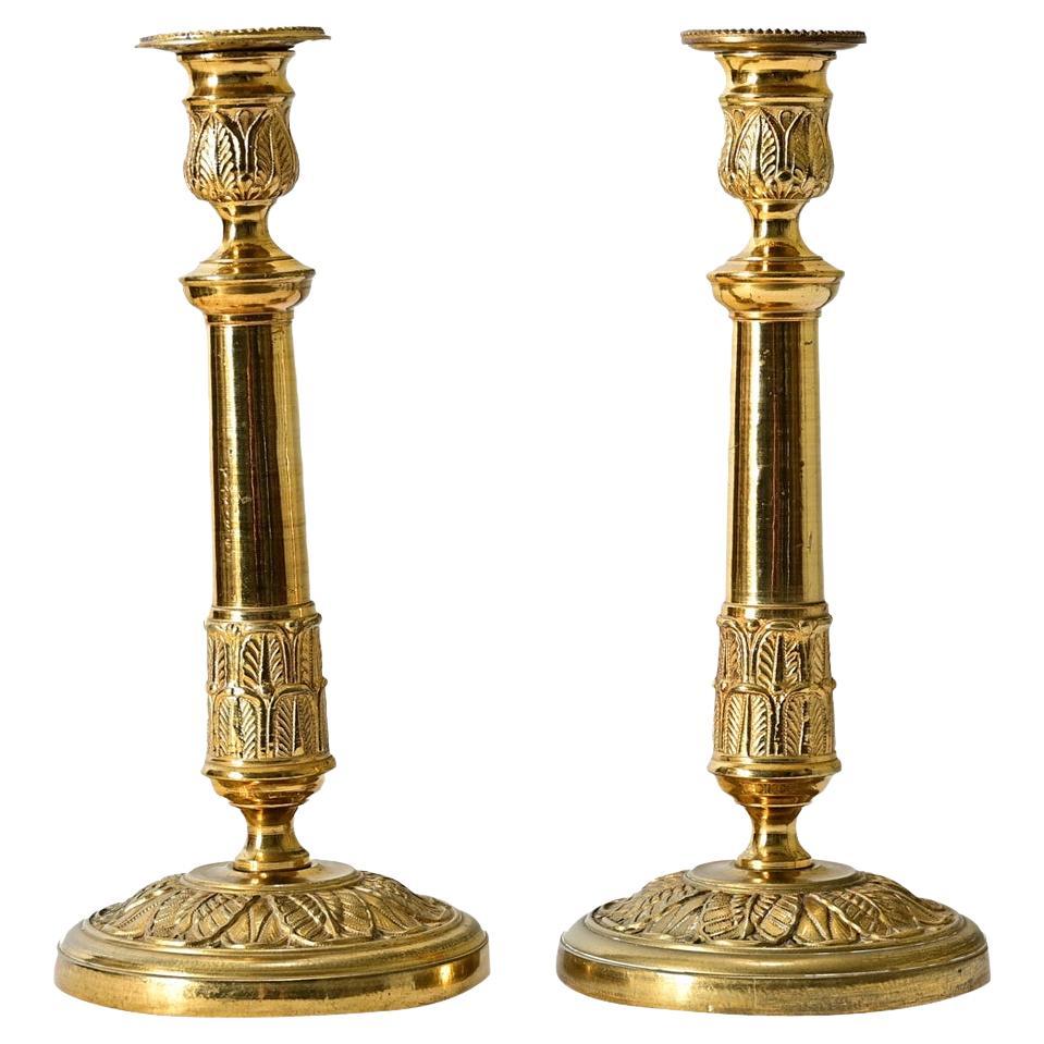 Paire de chandeliers Empire en laiton