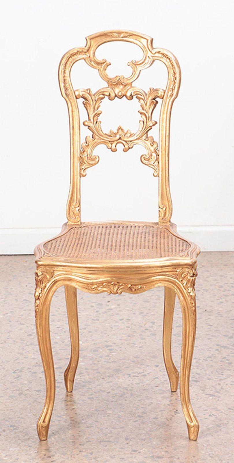 French Louis XV giltwood side chairs with hand carved foliate motif details all around. The rich gilt finish adds a touch of glamour and radiance to the chairs. Made in France, c. 1910's.
Dimensions:
35.5