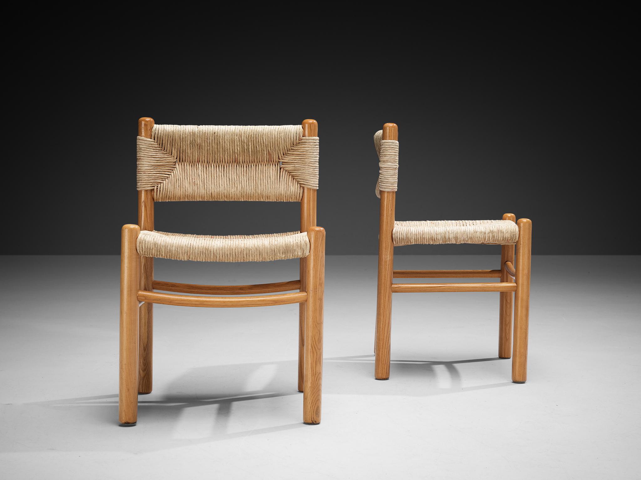 Français Paire de chaises de salle à manger français en frêne et paille en vente