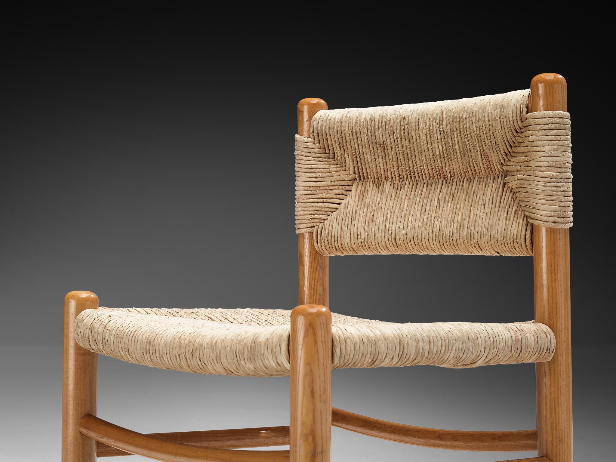 Milieu du XXe siècle Paire de chaises de salle à manger français en frêne et paille en vente