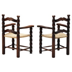 Pareja de sillas de comedor francesas de madera teñida y paja