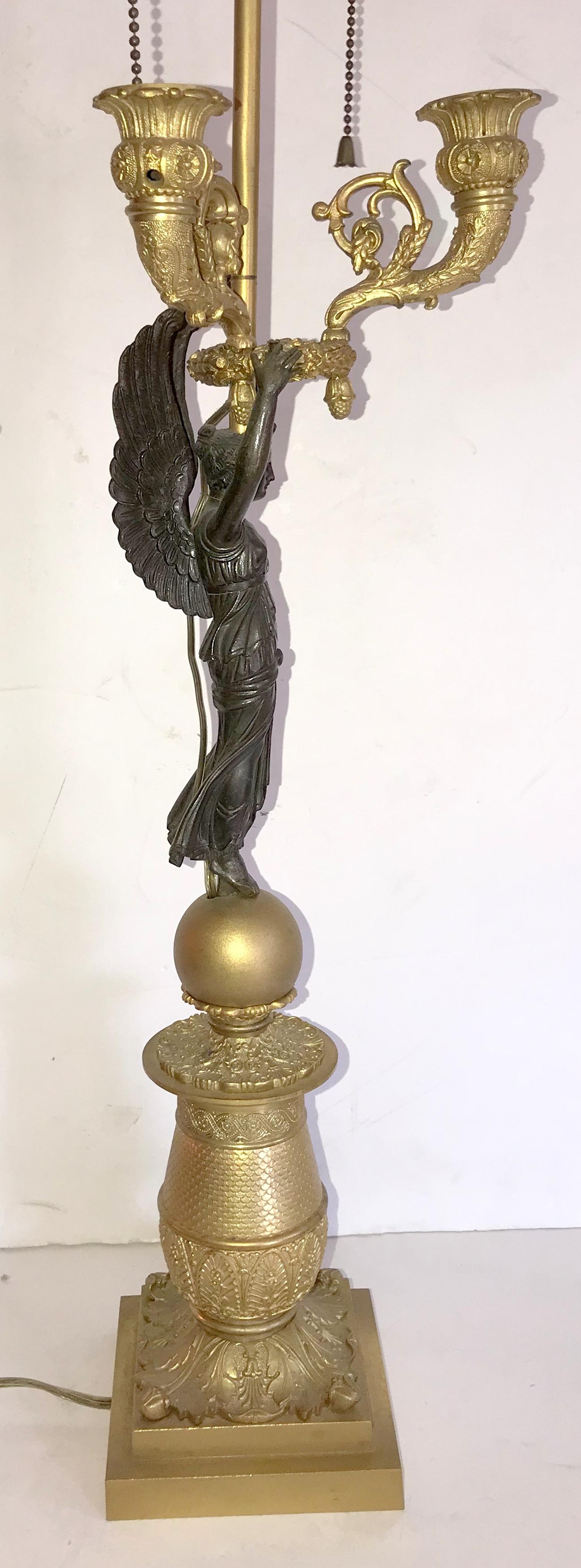 20th Century French Pair of Empire Patina Dore Bronze Winged Lady Victory Candelabras For Sale