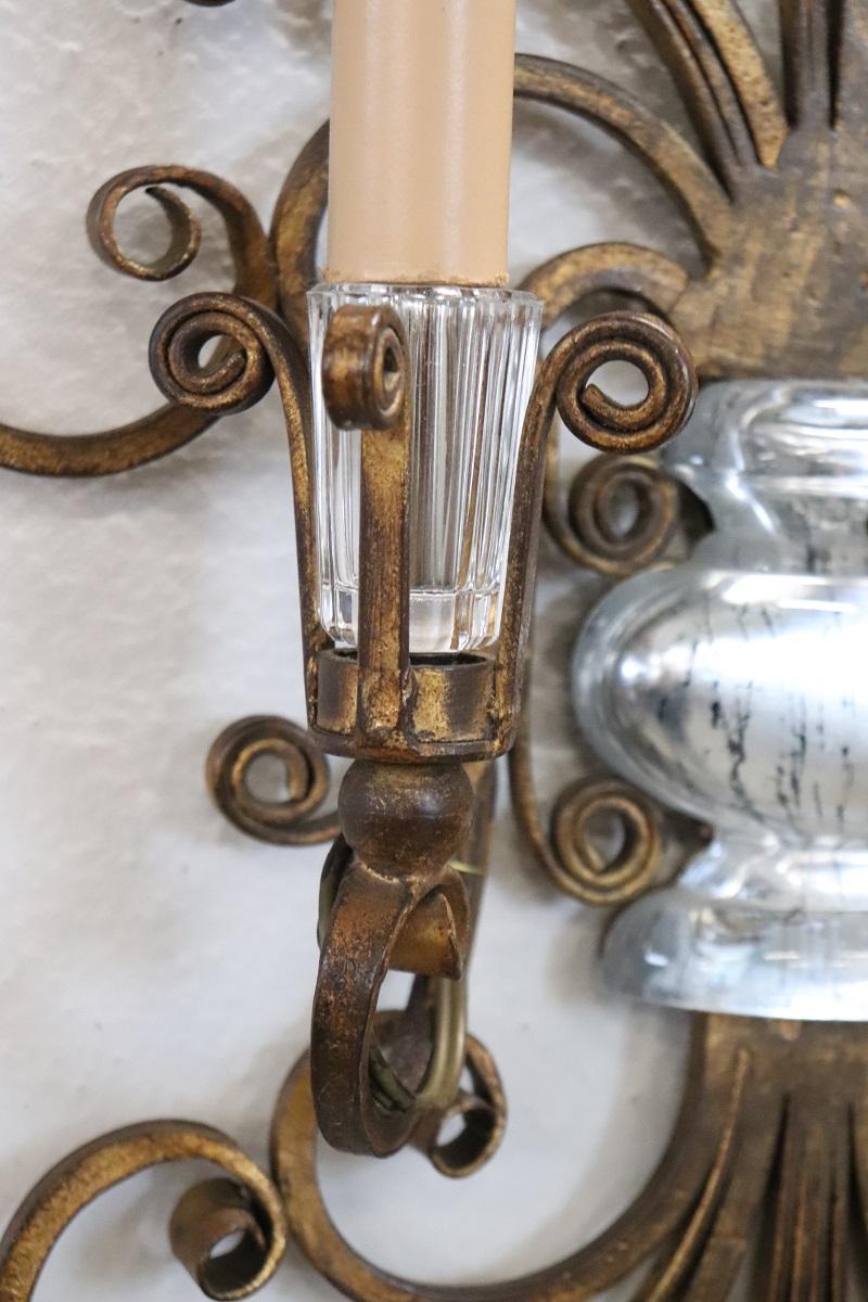 20th Century French Pair of Gilded Iron and Crystal Sconces by Maison Baguès, 1950s For Sale