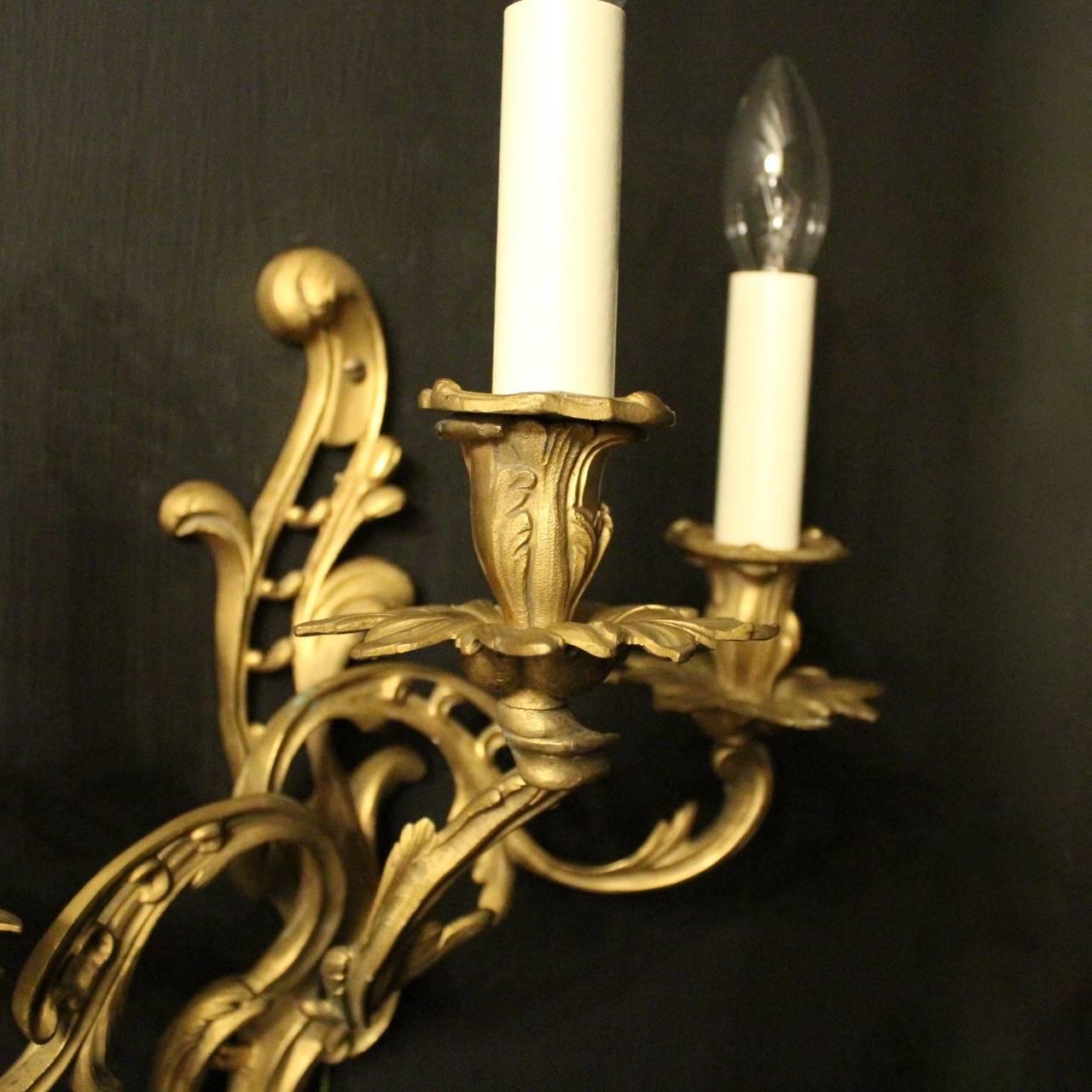 Rococo Revival French Pair of Gilded Triple Light Antique Wall Lights For Sale