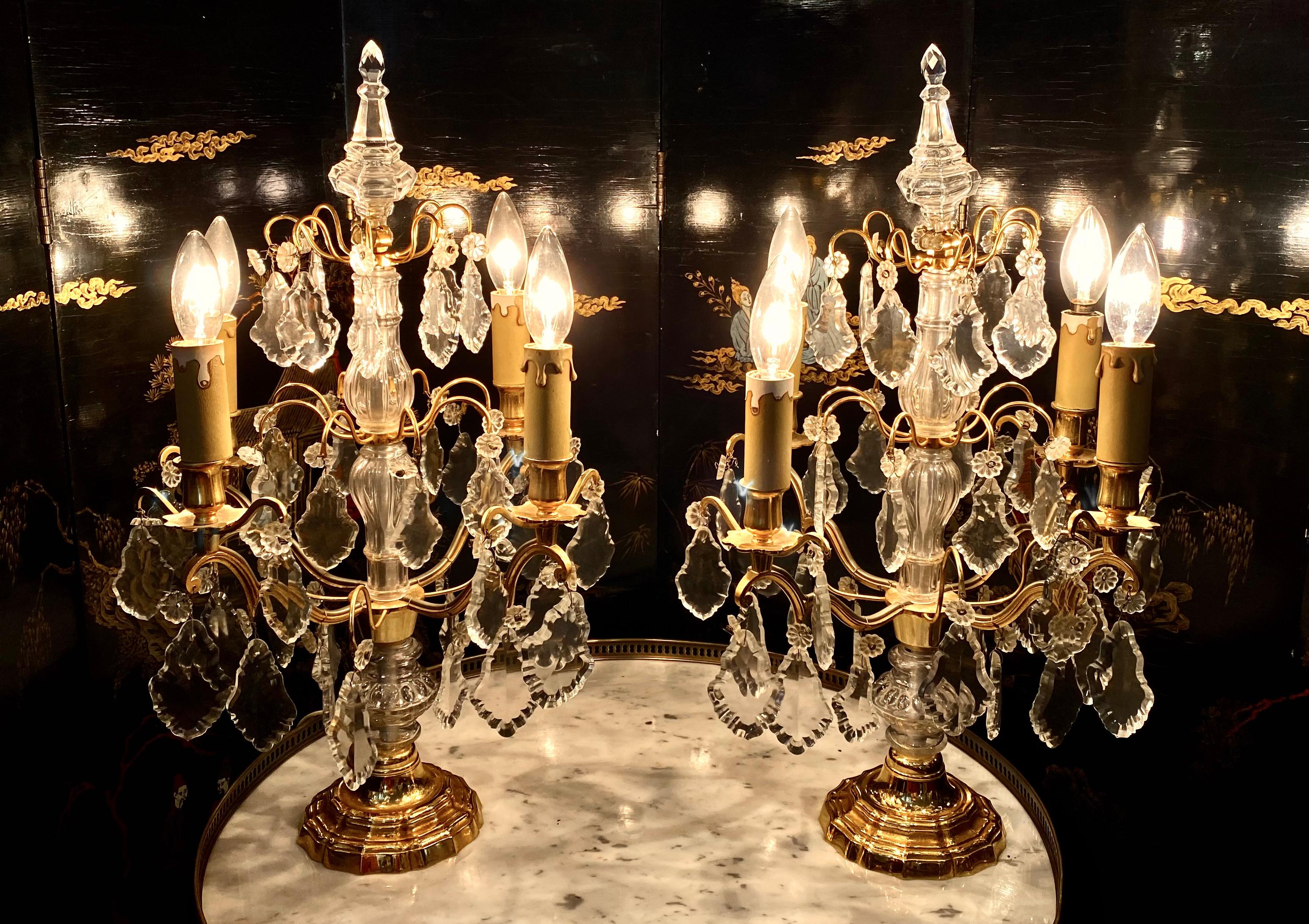 French pair of bronze girandoles candelabras with clear and amethyst crystals. Rare beautiful pair.

Dimensions: 17.5” H x 12” D
Base 5” D.