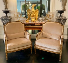 Paire de fauteuils en bois doré Marquise Bergere de style Louis XVI