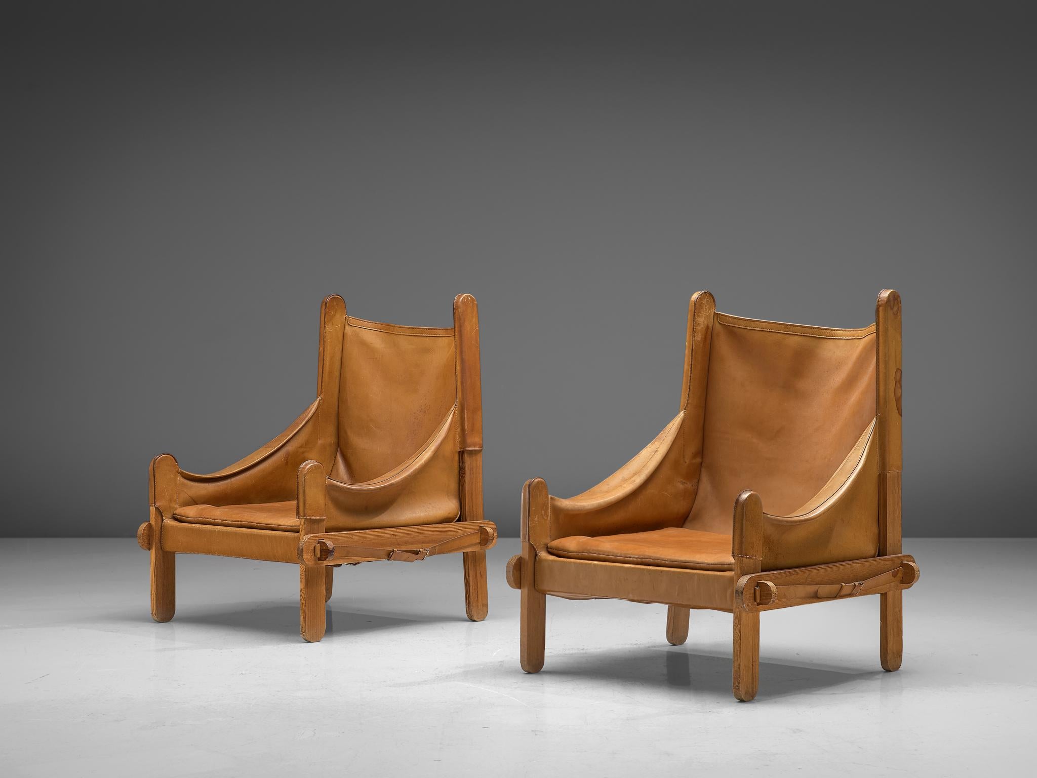 Mid-Century Modern French Pair of Lounge Chairs in Cognac Leather