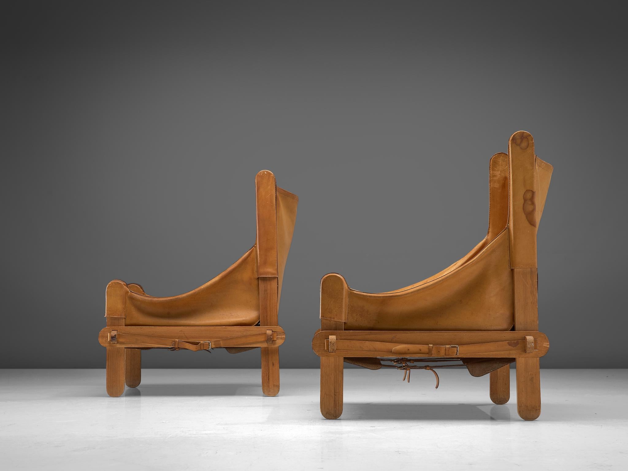 Mid-20th Century French Pair of Lounge Chairs in Cognac Leather