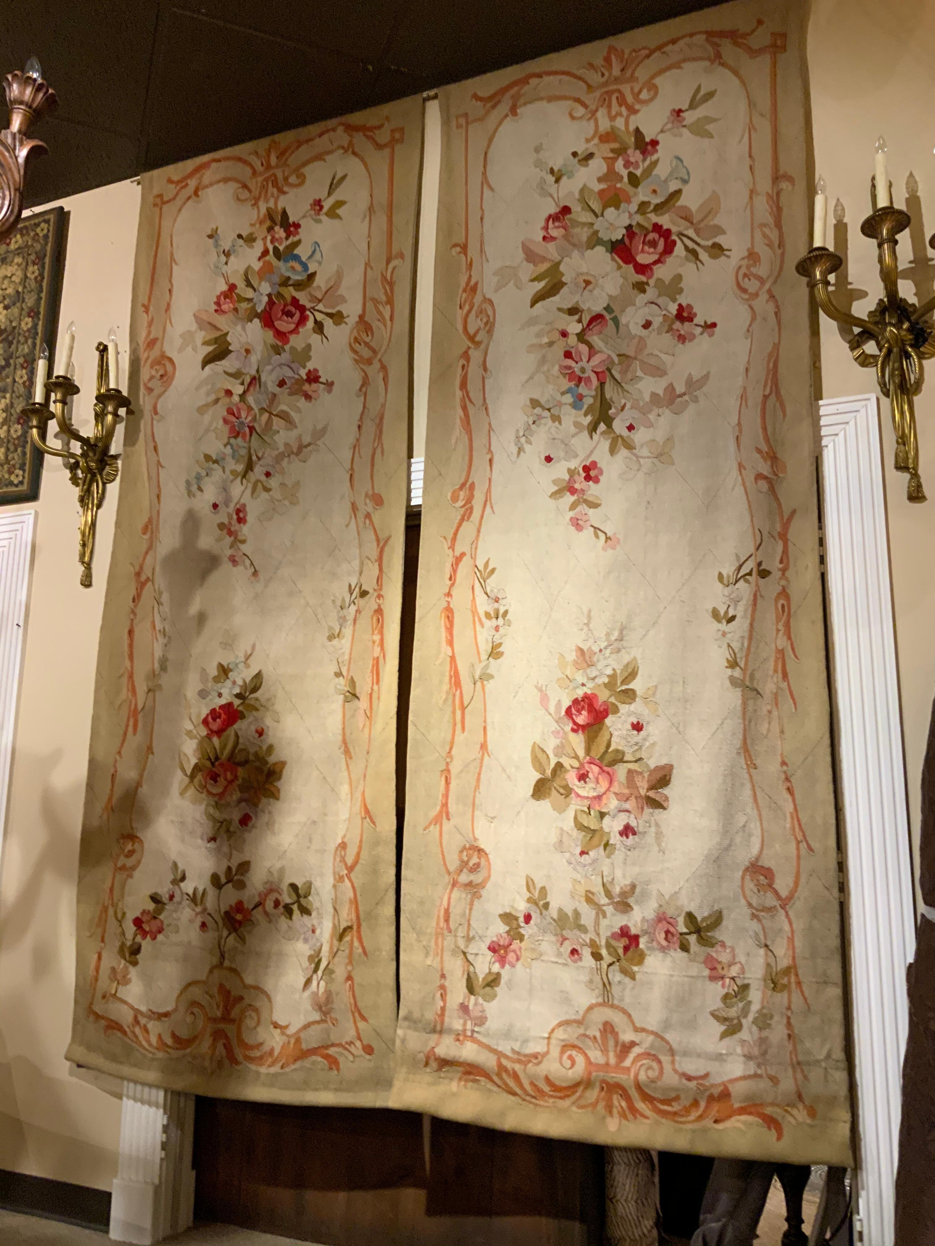 The name Aubusson is synonymous with finely created tapestries from
France. This pair is exceptional because they are elegant and very tall
Aubusson tapestries are prized for their timeless qualities: warmth
texture, artistic appeal and history.