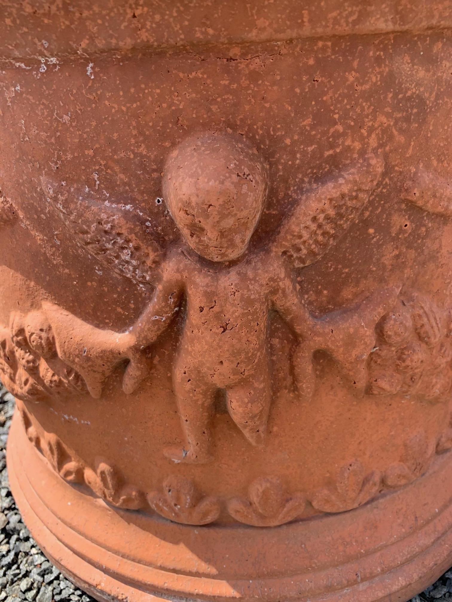 French Pair of Vintage Terracotta Planters Pots with Swags and Putti In Good Condition In Hopewell, NJ