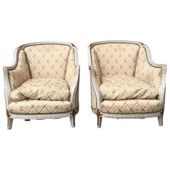 French Pair of White Painted Rococo Bergère Armchairs