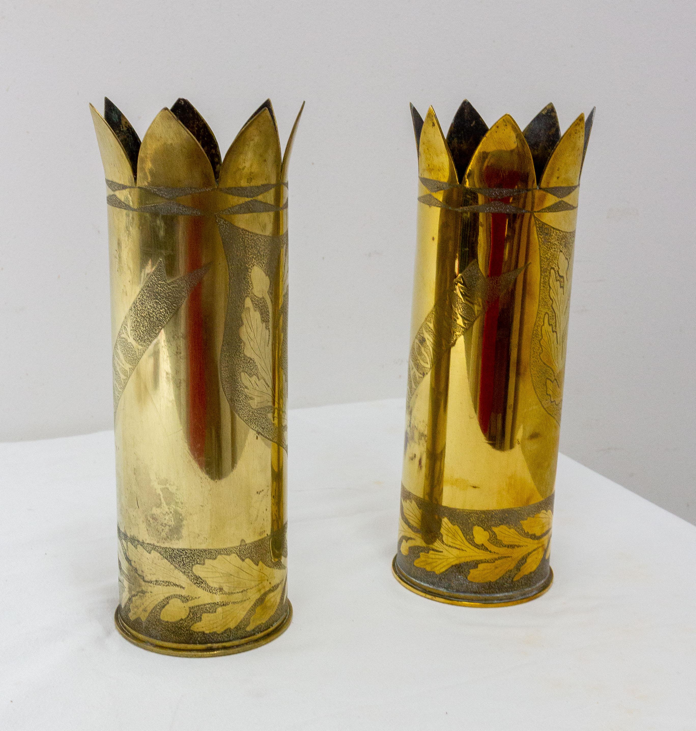 Antique French pair of shell casings from the World War I vases.
Trench Artillery
Brass engraved representing on each casing.
This pair can also also be used as vases.
Good condition.

Shipping:
L30 P18 H8,5 2,4 kg.

 