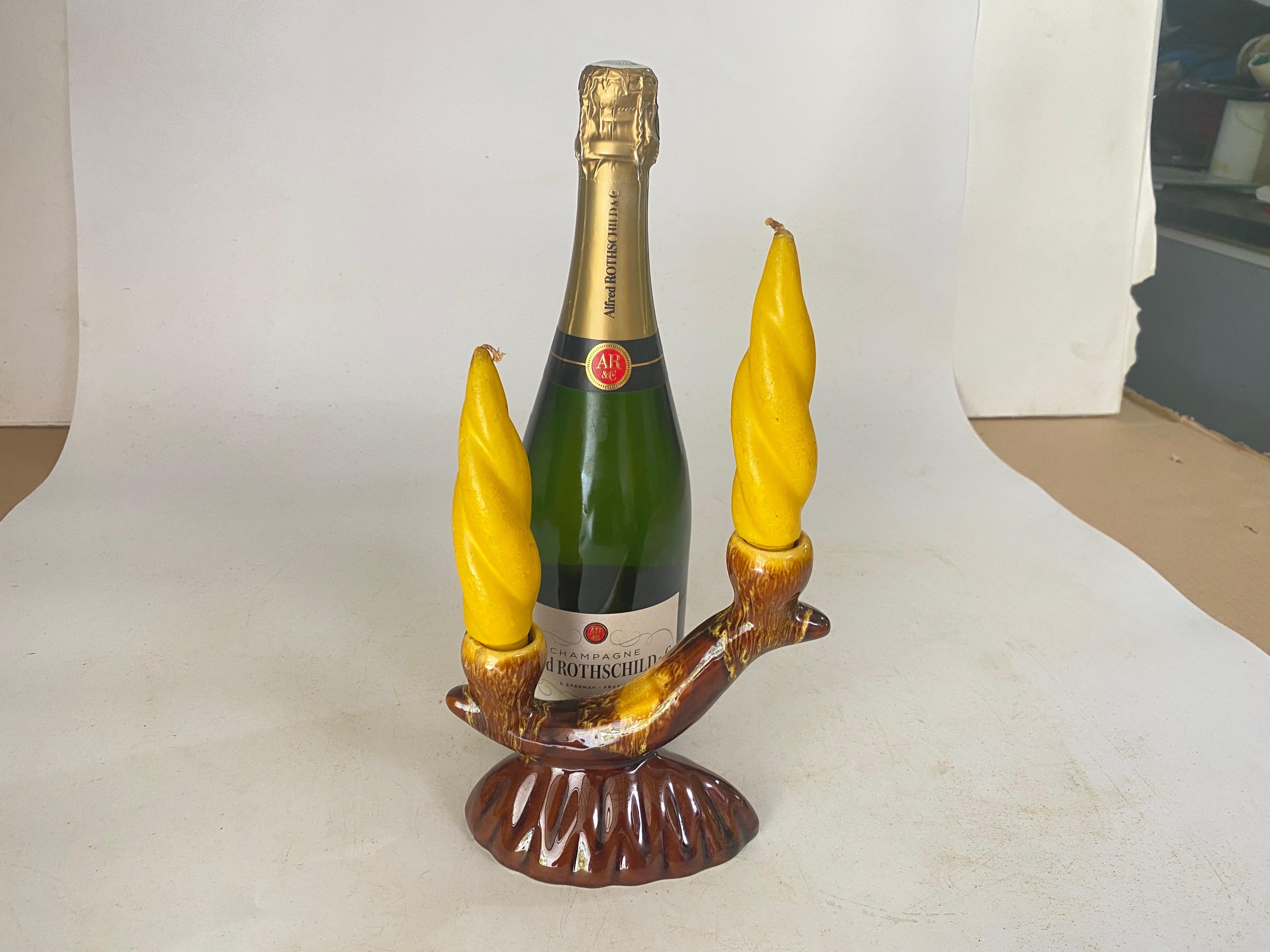 This is a pair of Candle Holder . It has been made in France circa 1970.
The color is Brown.

The size includes the candles Height.