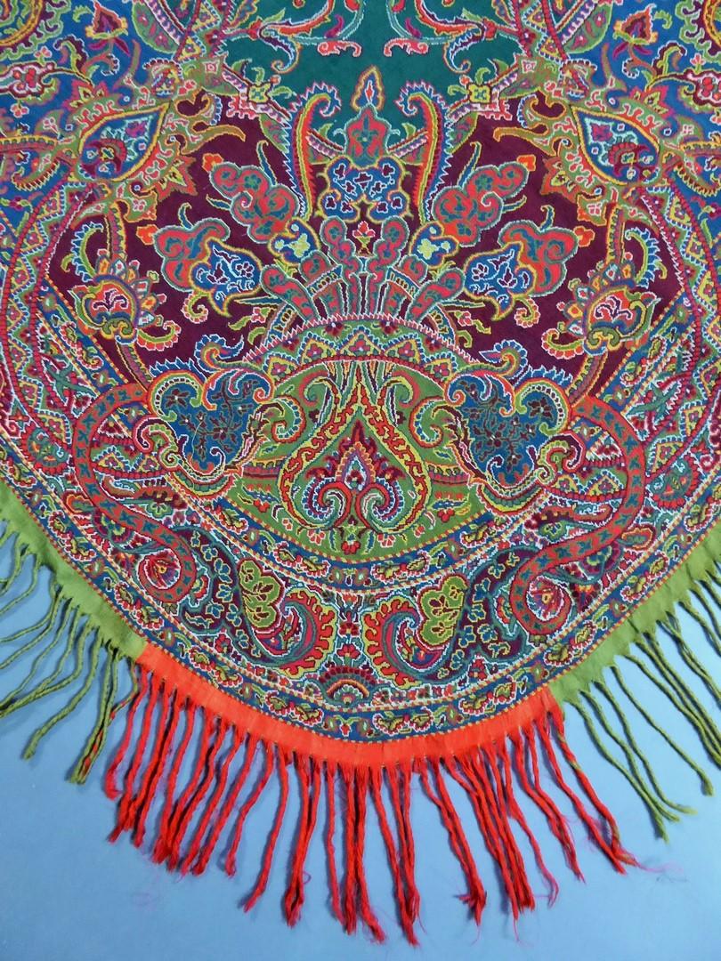 France Paris 
Circa 1839
An early Jacquard shawl woven in shape and numbered 17280485 which allowed to fit closely to the form of the gigot sleeves dresses of the same period. Neo-gothic design with large center moon shape and  architectured rolling