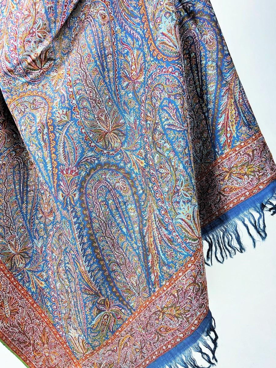 Circa 1850
France

Beautiful square French Paisley cashmere shawl with full fields of long palmettes on a blue background, dating from the end of the Louis-Philippe period or the beginning of the French Second Empire. Probably made in Lyon or Nîmes,