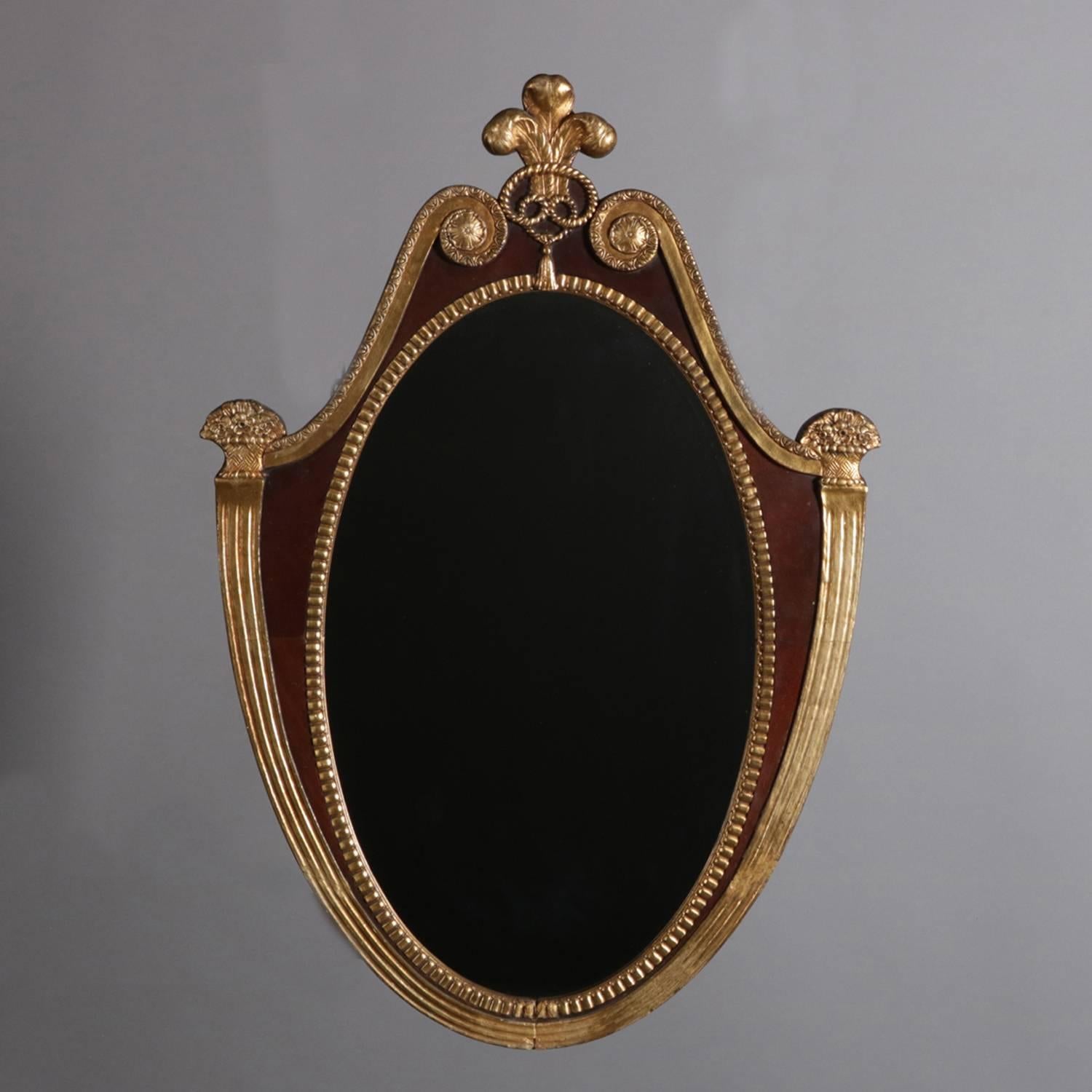 Carved French Parcel Gilt Mahogany Federal Style Shield Form Wall Mirror, 20th Century