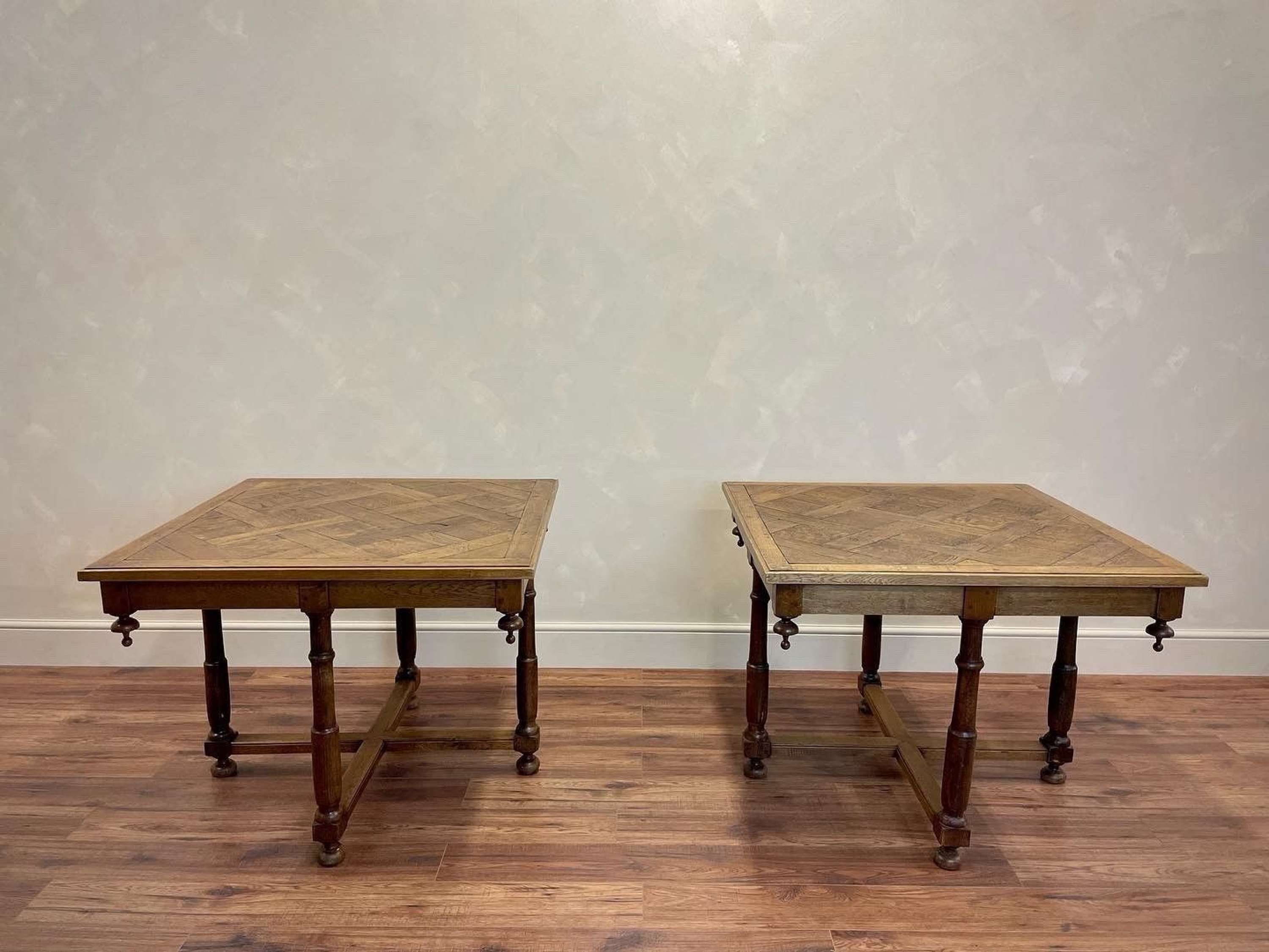 Highly unusual and super quality, pair of solid oak tables, with beautiful cross stretchers.
Old squared parquetry tops, with hand-turned finial decorations.
France 1900.
Check the sizes on these as they are larger than the photos would make them