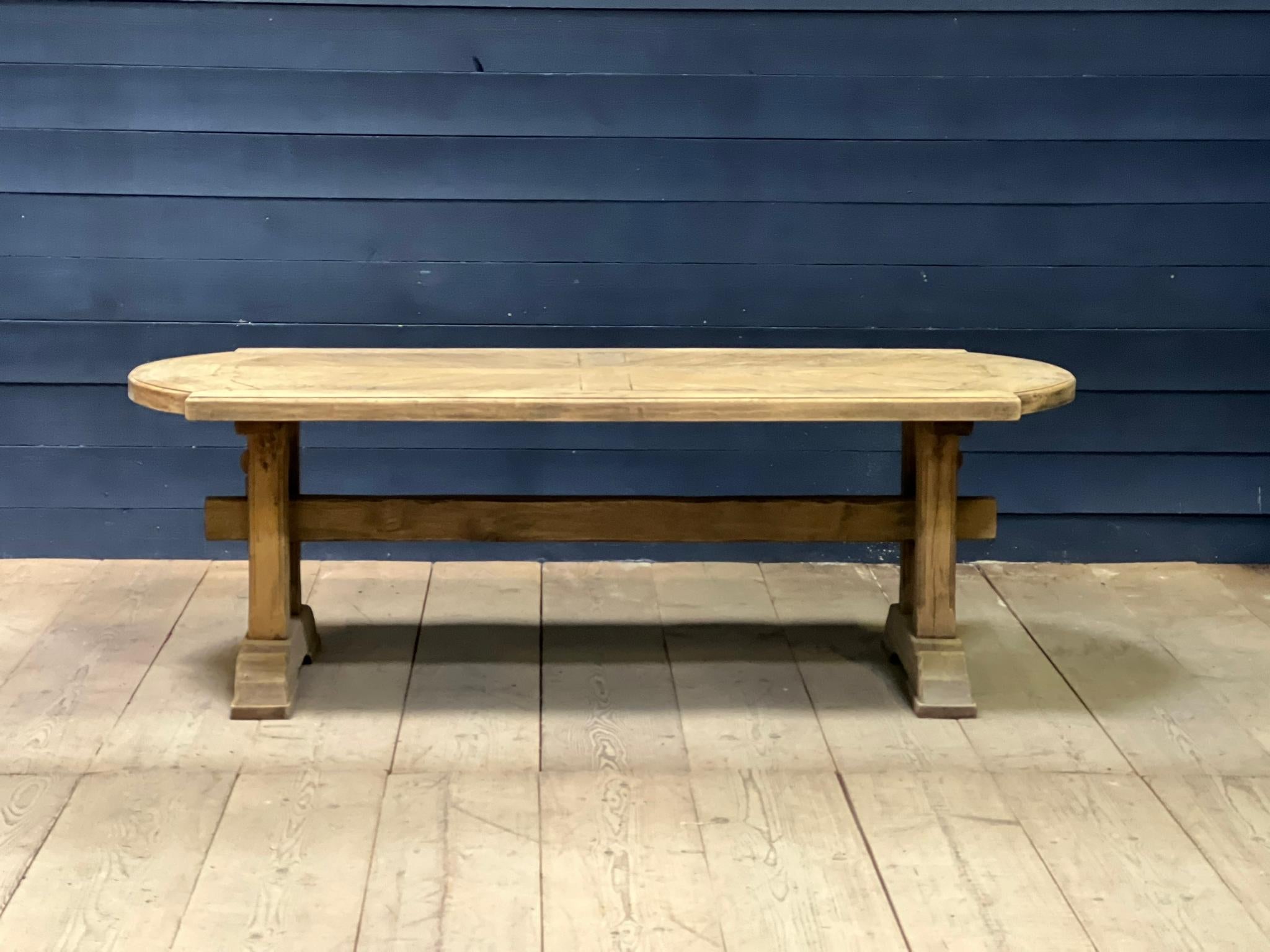 A superb farmhouse trestle dining table having a lovely solid oak Parquetry Top. The whole table is Solid Oak and French in origin dating to the early 1900s. Of excellent quality construction this table will be around for generations to come.
We