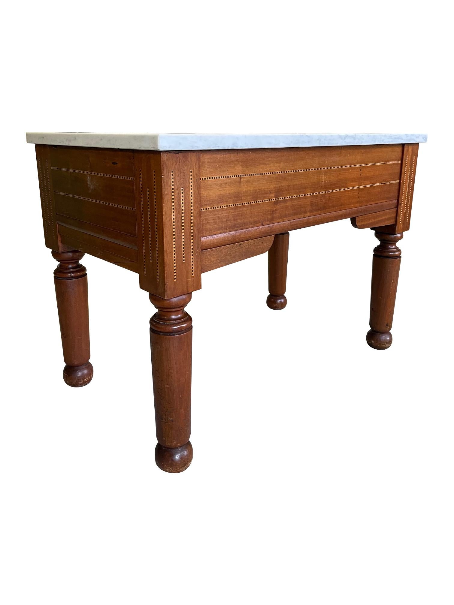 A French Pastry / Chocolatier table with white marble top, lovely Art Deco feel to the design of the table, with lovely inlay details to the front and both sides of the table

Height 76cm / 29.9”

Width 107cm / 42.1”

Depth 62cm / 24.4”