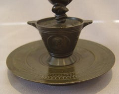 French patinated bronze candlesticks in the form of a lily in a pot