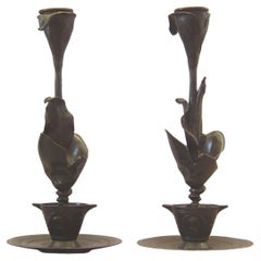 French patinated bronze candlesticks in the form of a lily in a pot