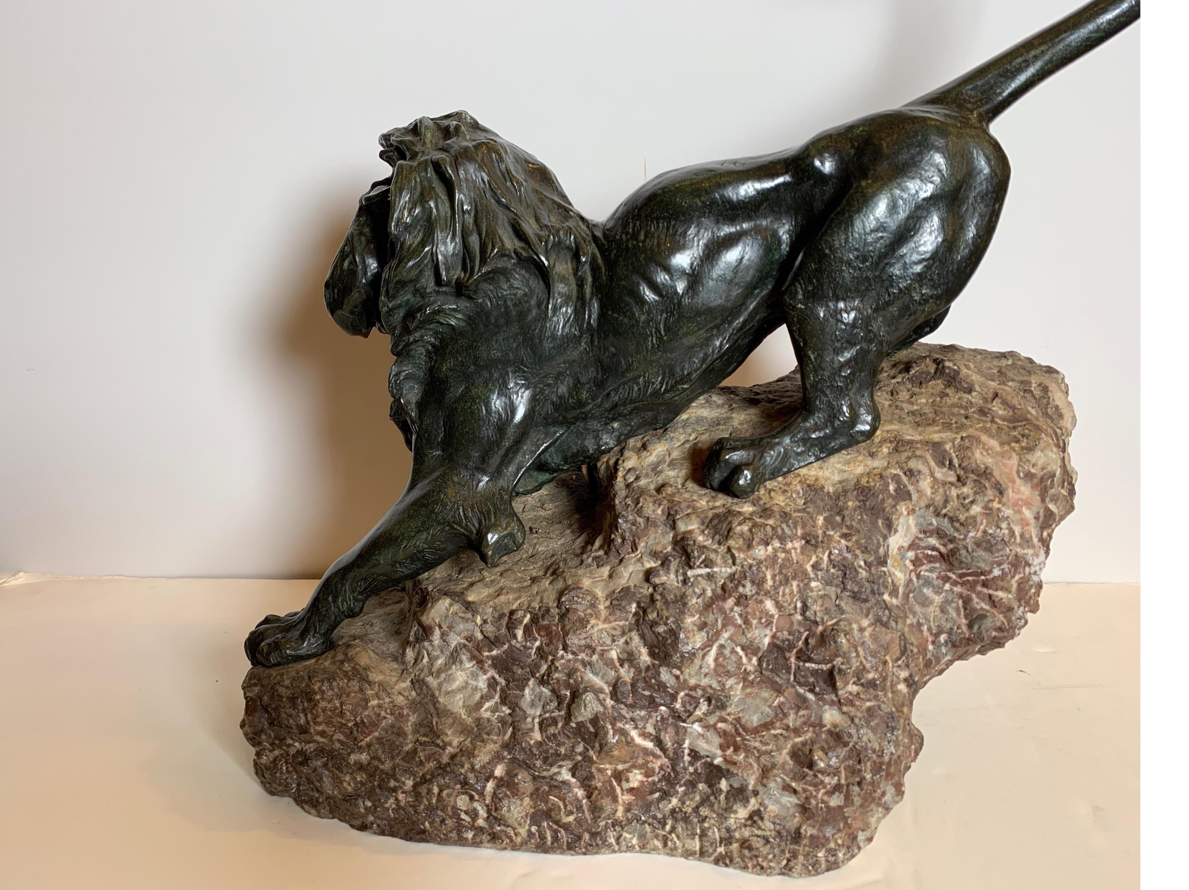 French Patinated Bronze Figure of a Lion on Rock Base In Excellent Condition In Lambertville, NJ