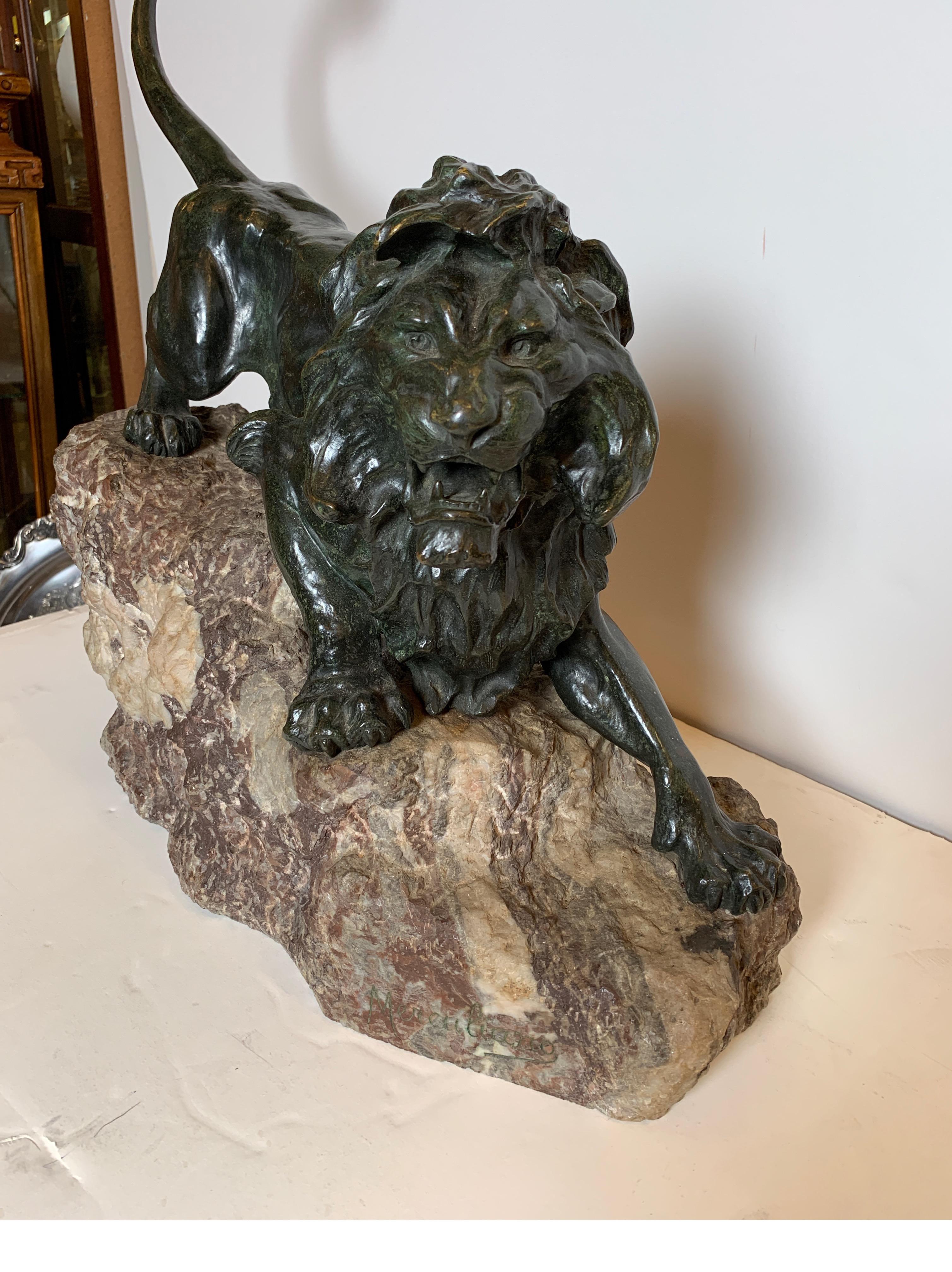 Stone French Patinated Bronze Figure of a Lion on Rock Base