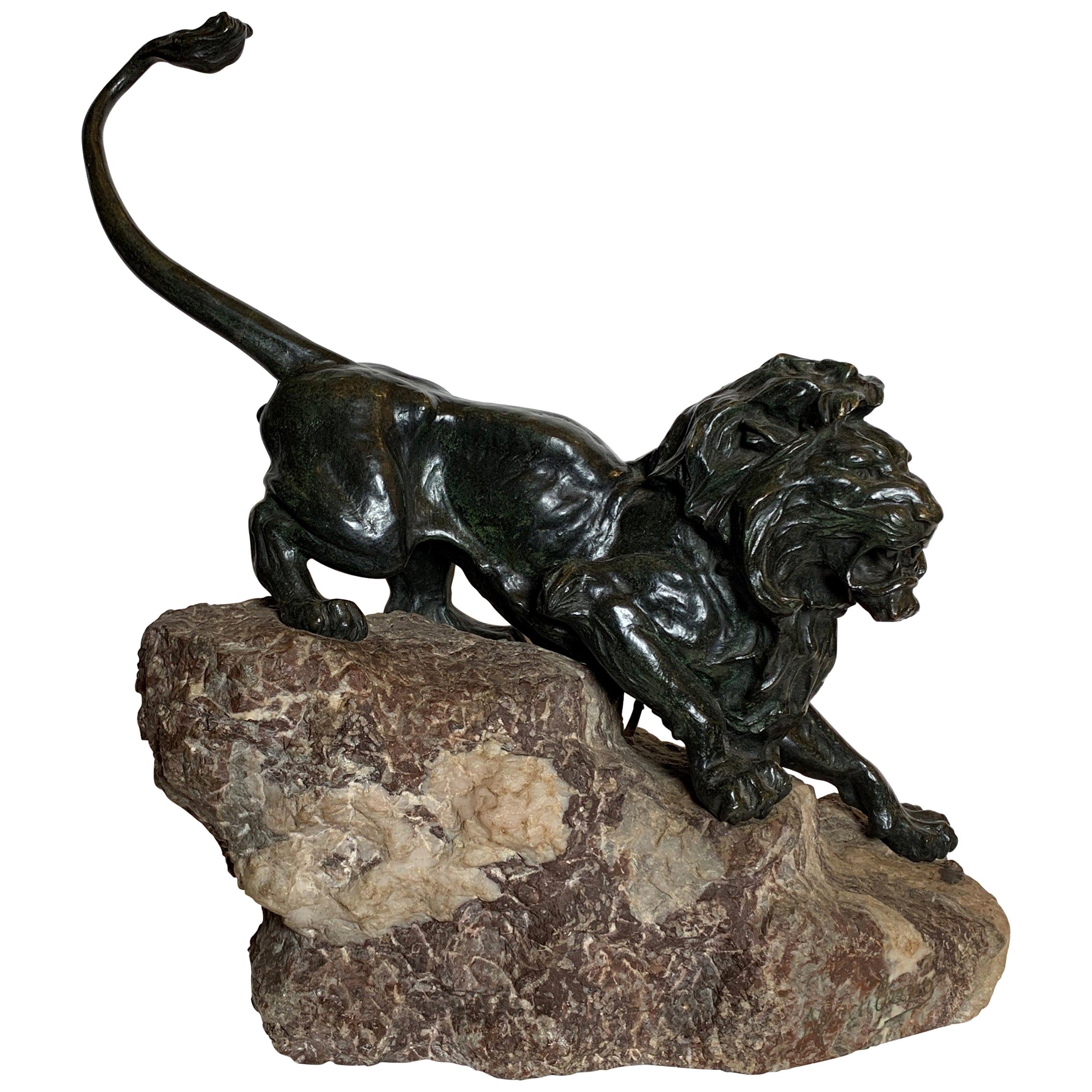 French Patinated Bronze Figure of a Lion on Rock Base