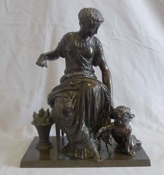 French patinated bronze group of woman and cupid by Jean Jules Salmson