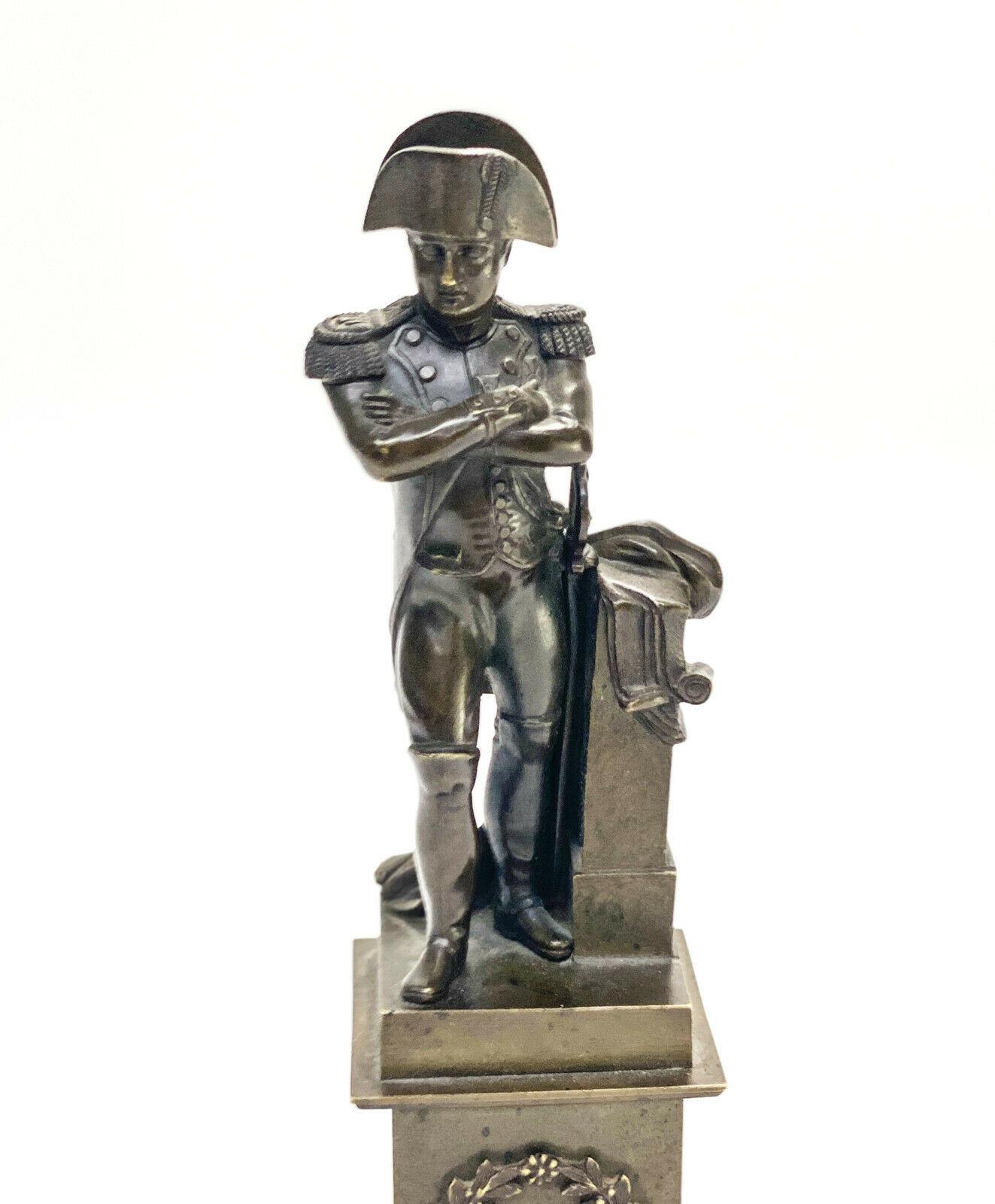 French patinated bronze Napoleon Bonaparte Miniature sculpture, 19th century

The figurine depicts Napoleon in his military garbs and in a commanding stance. The adjustable sword could be tilted inward or by his side.

Additional