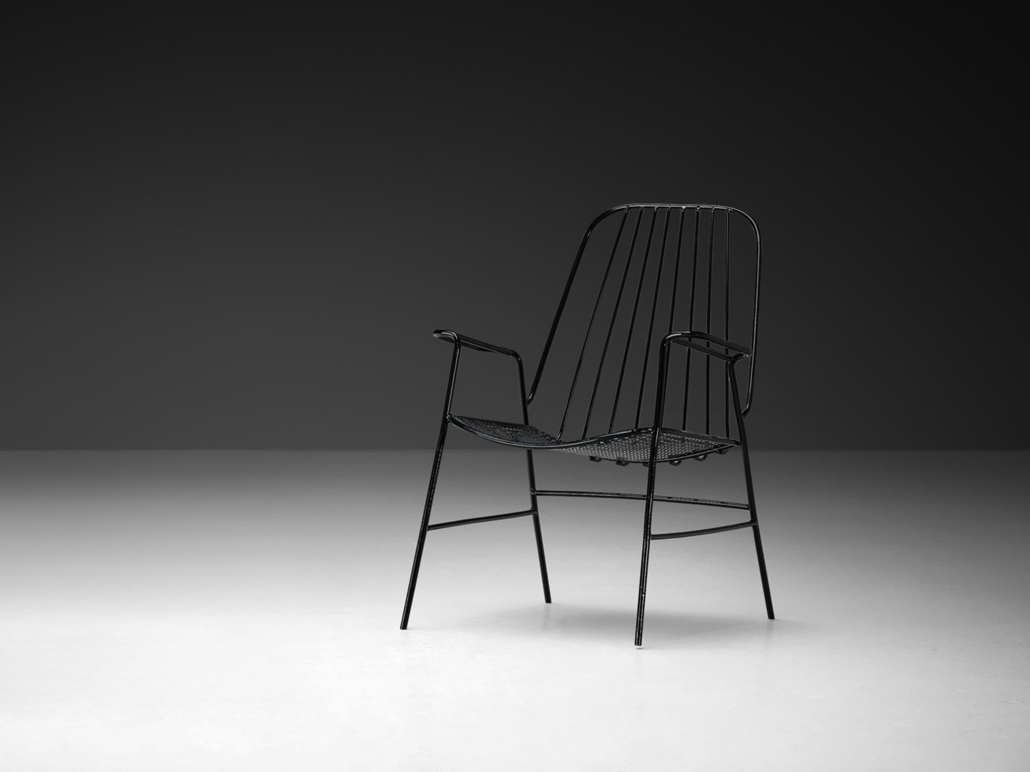 Patio armchair, lacquered iron, France, 1970s

French chair defined by its elegant and airy look with its open framework and singular black color. The designer used quadrifoil perforated sheet iron for the seat. A material that played a major role