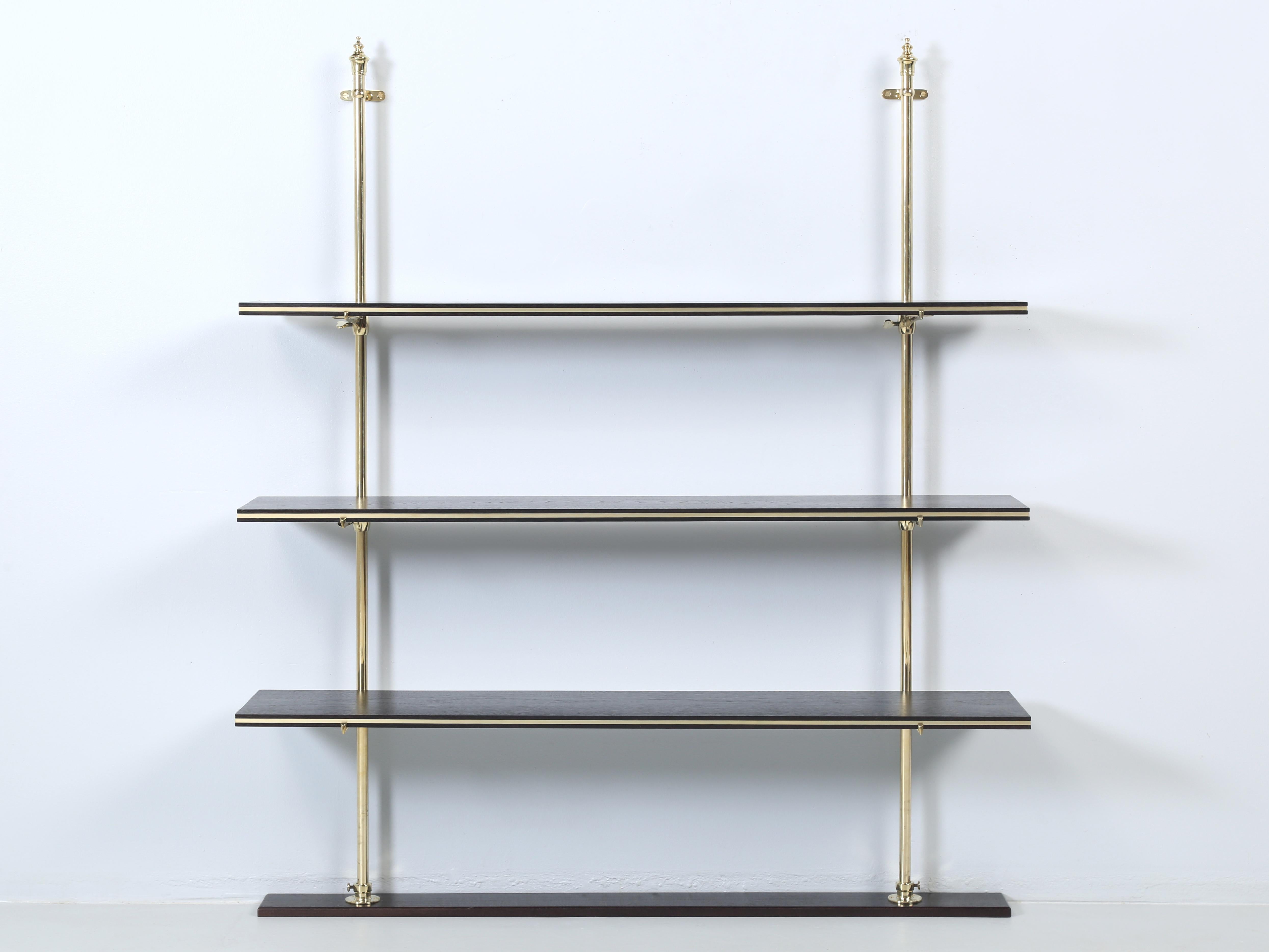 French Pâtisserie Boulangerie (Bakery) or Possibly a French Bistro Brass Shelf Retail Display. Our Old Plank Restoration Department just finished a thorough restoration of our polished brass 3-shelf display stand with custom fabricated solid walnut