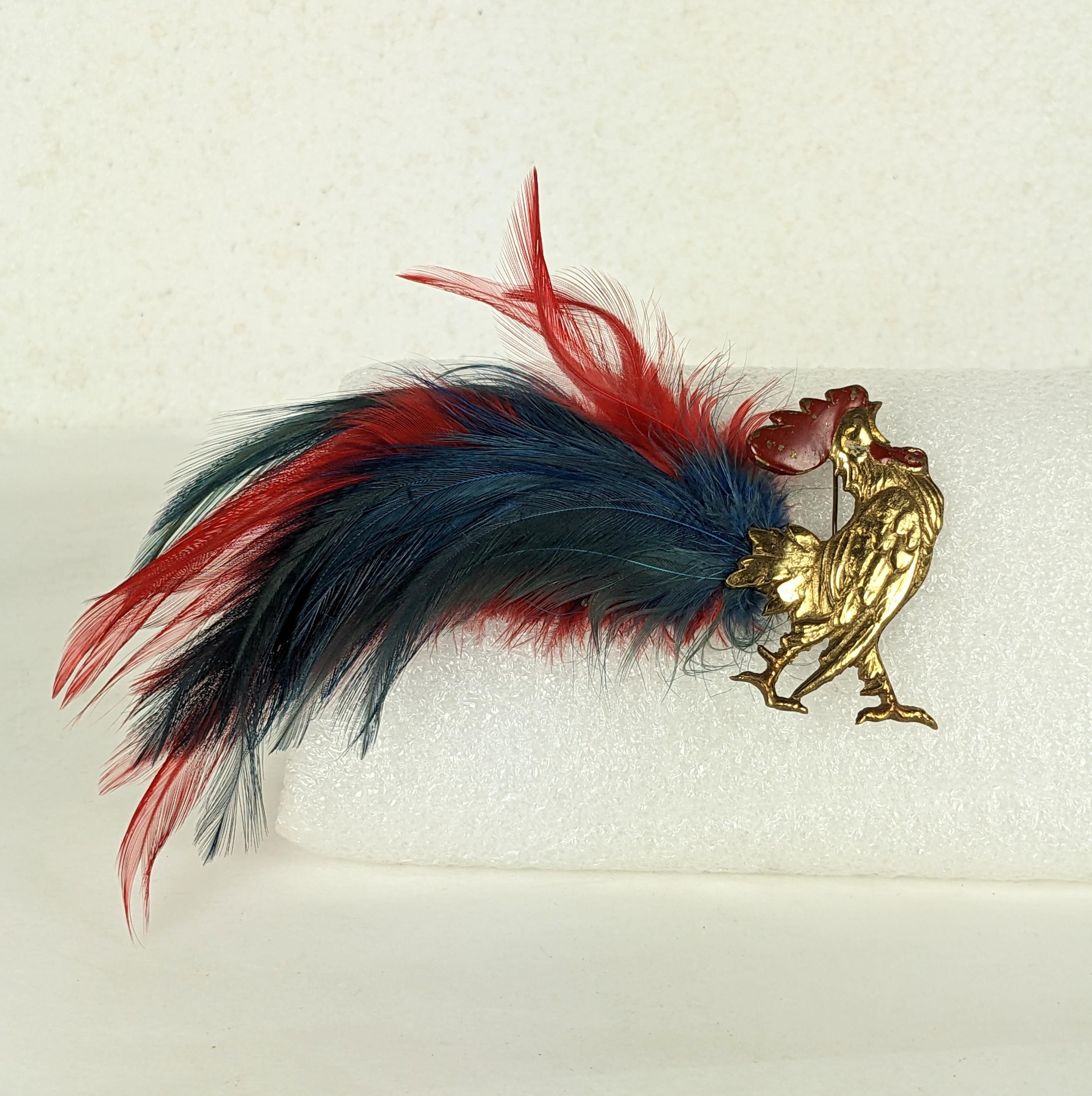 Striking French Patriotic Rooster Brooch in bronze with red and blue feathers and red cold enamel  from the 1940's. Measures 6